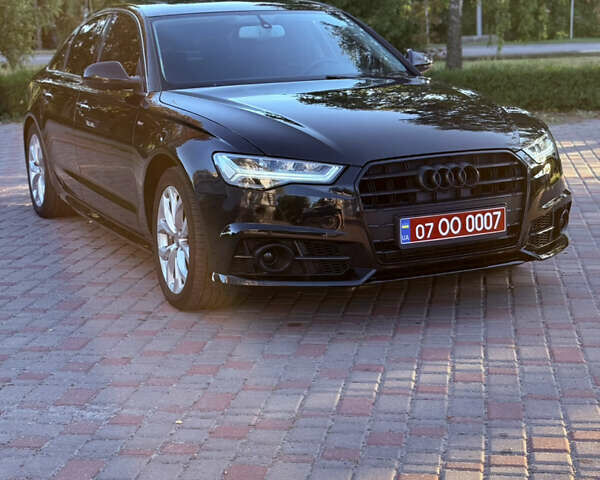 Черный Ауди А6, объемом двигателя 2 л и пробегом 189 тыс. км за 16900 $, фото 12 на Automoto.ua