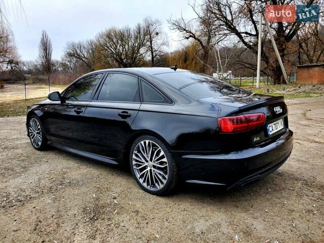 Черный Ауди А6, объемом двигателя 1.98 л и пробегом 119 тыс. км за 18900 $, фото 6 на Automoto.ua