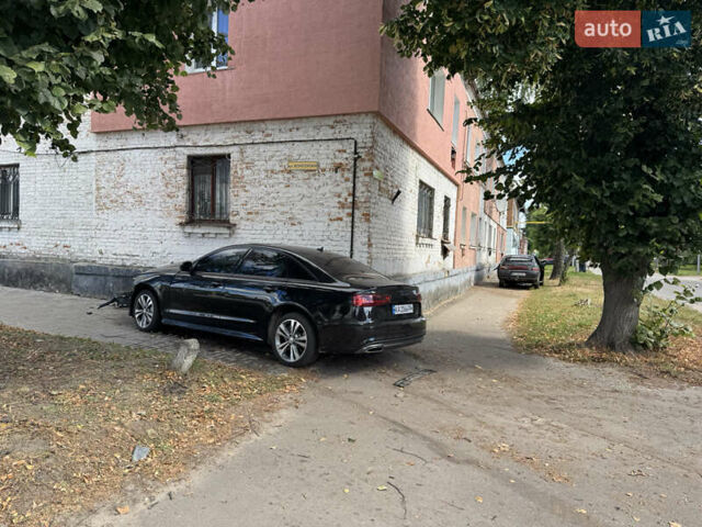 Черный Ауди А6, объемом двигателя 2 л и пробегом 130 тыс. км за 8000 $, фото 7 на Automoto.ua