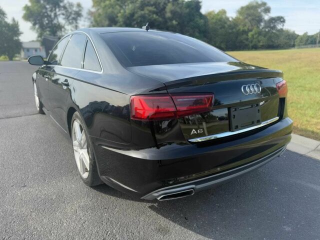 Чорний Ауді А6, об'ємом двигуна 2 л та пробігом 70 тис. км за 11600 $, фото 4 на Automoto.ua
