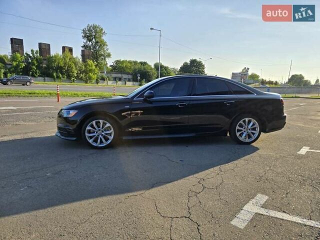 Черный Ауди А6, объемом двигателя 1.98 л и пробегом 100 тыс. км за 16450 $, фото 4 на Automoto.ua
