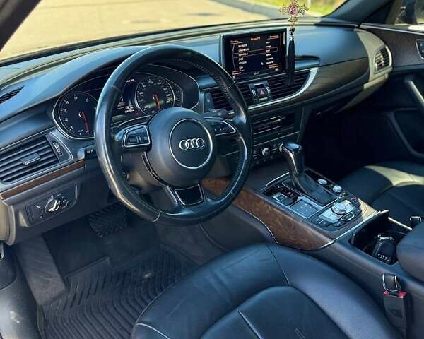 Черный Ауди А6, объемом двигателя 1.98 л и пробегом 206 тыс. км за 17500 $, фото 13 на Automoto.ua