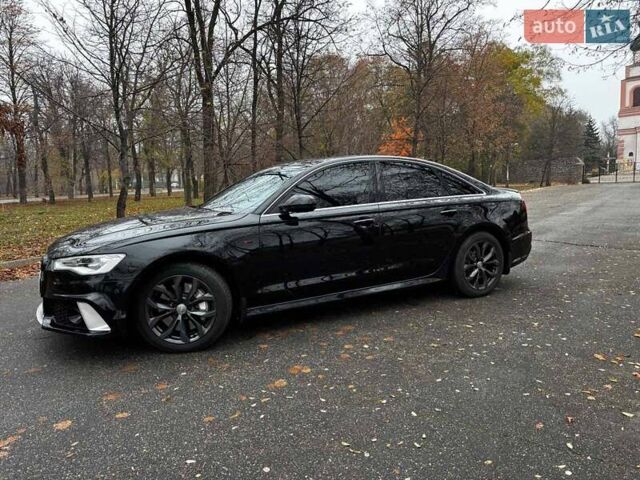 Чорний Ауді А6, об'ємом двигуна 2 л та пробігом 108 тис. км за 18490 $, фото 1 на Automoto.ua