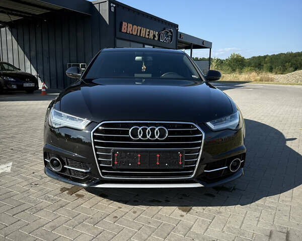 Черный Ауди А6, объемом двигателя 2 л и пробегом 91 тыс. км за 17300 $, фото 1 на Automoto.ua