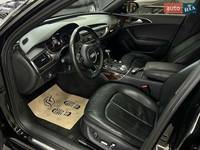 Черный Ауди А6, объемом двигателя 1.98 л и пробегом 148 тыс. км за 24000 $, фото 2 на Automoto.ua