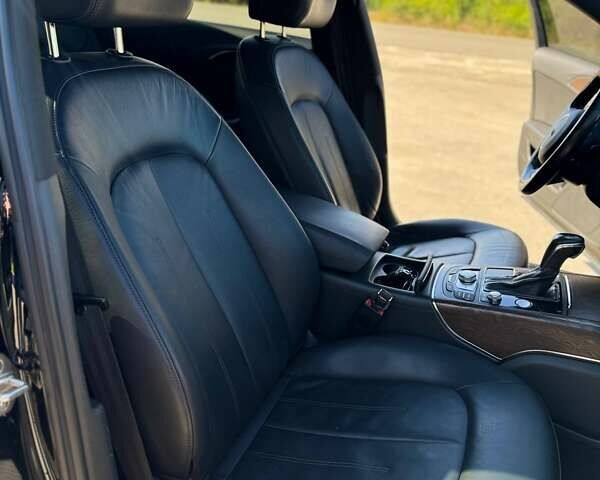 Черный Ауди А6, объемом двигателя 1.98 л и пробегом 206 тыс. км за 15500 $, фото 9 на Automoto.ua