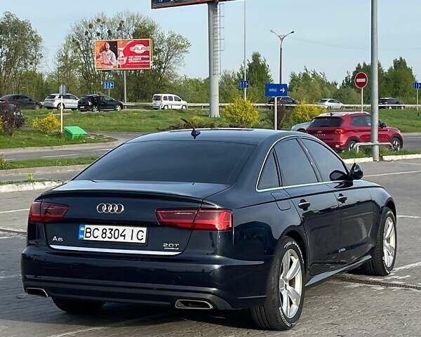 Черный Ауди А6, объемом двигателя 2 л и пробегом 145 тыс. км за 16599 $, фото 2 на Automoto.ua