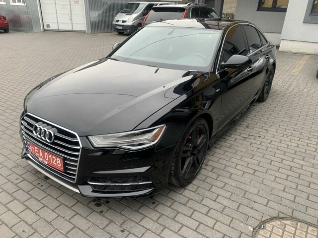 Черный Ауди А6, объемом двигателя 2 л и пробегом 165 тыс. км за 18800 $, фото 2 на Automoto.ua