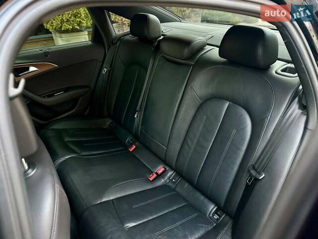 Черный Ауди А6, объемом двигателя 1.98 л и пробегом 186 тыс. км за 16500 $, фото 17 на Automoto.ua