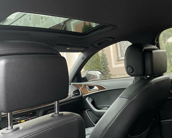 Черный Ауди А6, объемом двигателя 2 л и пробегом 193 тыс. км за 17850 $, фото 101 на Automoto.ua