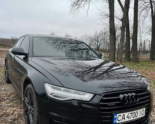 Черный Ауди А6, объемом двигателя 2 л и пробегом 124 тыс. км за 23500 $, фото 3 на Automoto.ua