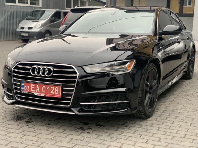 Черный Ауди А6, объемом двигателя 2 л и пробегом 165 тыс. км за 18800 $, фото 1 на Automoto.ua