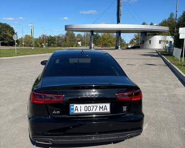 Черный Ауди А6, объемом двигателя 1.98 л и пробегом 206 тыс. км за 15500 $, фото 70 на Automoto.ua