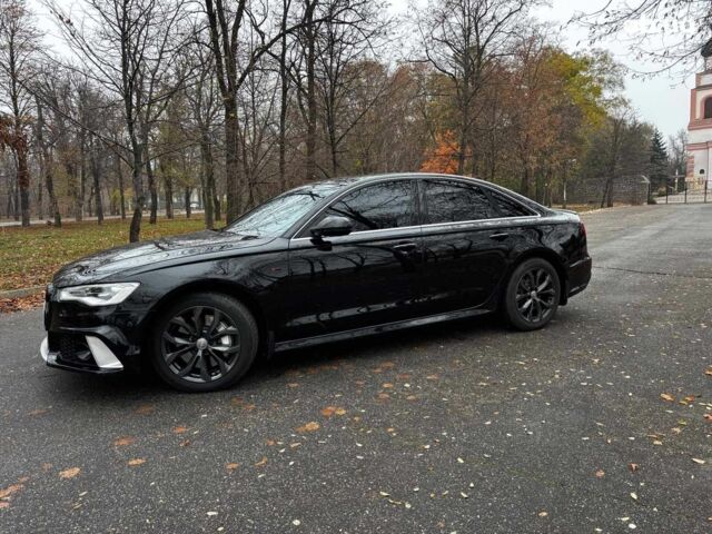 Чорний Ауді А6, об'ємом двигуна 2 л та пробігом 108 тис. км за 18490 $, фото 1 на Automoto.ua