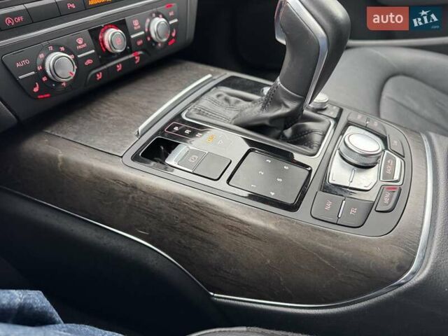 Черный Ауди А6, объемом двигателя 1.98 л и пробегом 171 тыс. км за 15900 $, фото 5 на Automoto.ua