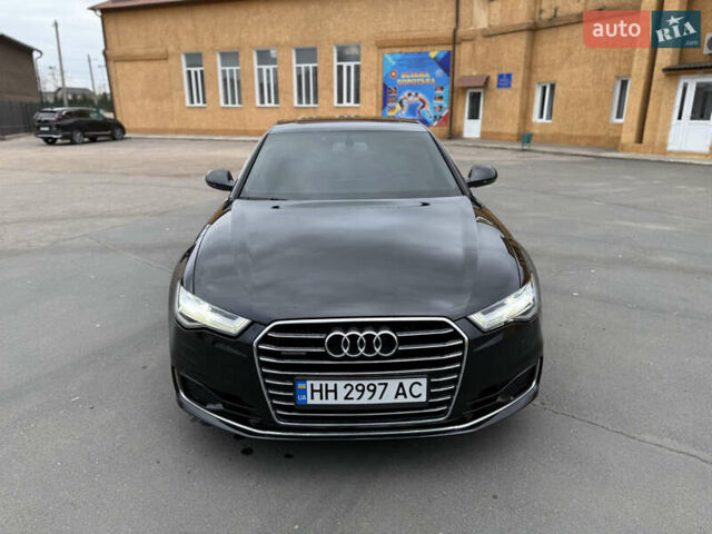 Черный Ауди А6, объемом двигателя 1.97 л и пробегом 214 тыс. км за 20500 $, фото 2 на Automoto.ua