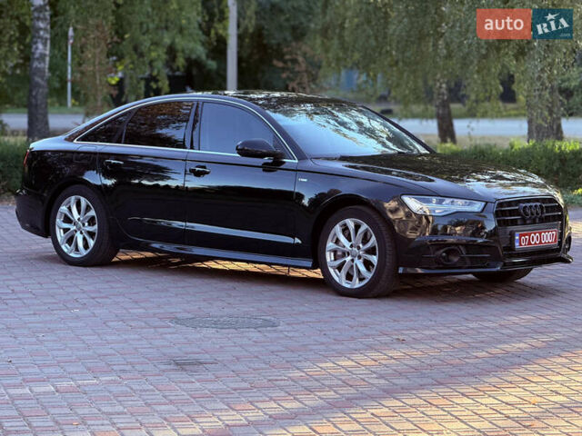 Черный Ауди А6, объемом двигателя 2 л и пробегом 189 тыс. км за 16900 $, фото 1 на Automoto.ua