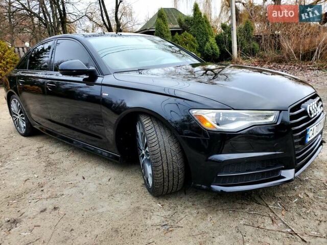 Черный Ауди А6, объемом двигателя 1.98 л и пробегом 119 тыс. км за 18900 $, фото 2 на Automoto.ua