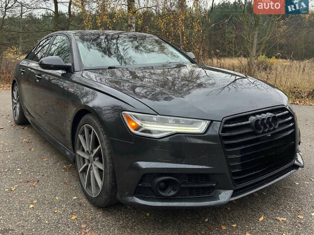 Черный Ауди А6, объемом двигателя 3 л и пробегом 199 тыс. км за 19800 $, фото 1 на Automoto.ua