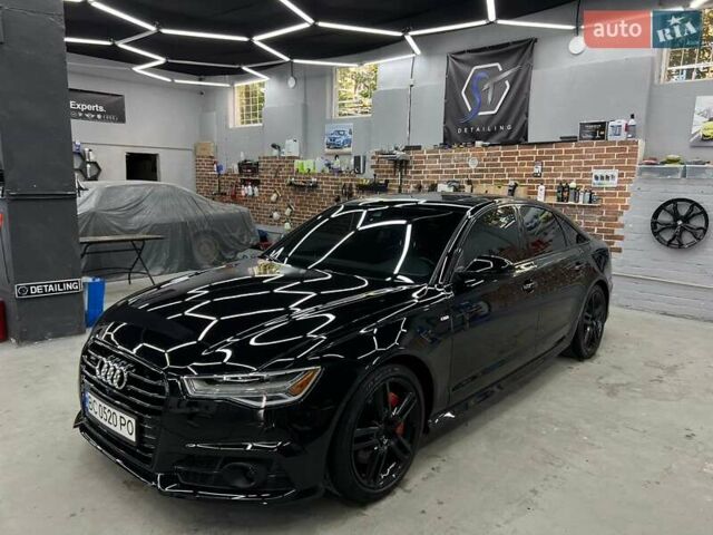 Черный Ауди А6, объемом двигателя 1.98 л и пробегом 148 тыс. км за 24000 $, фото 1 на Automoto.ua