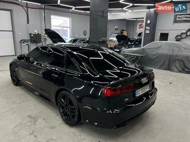 Черный Ауди А6, объемом двигателя 1.98 л и пробегом 148 тыс. км за 24000 $, фото 7 на Automoto.ua