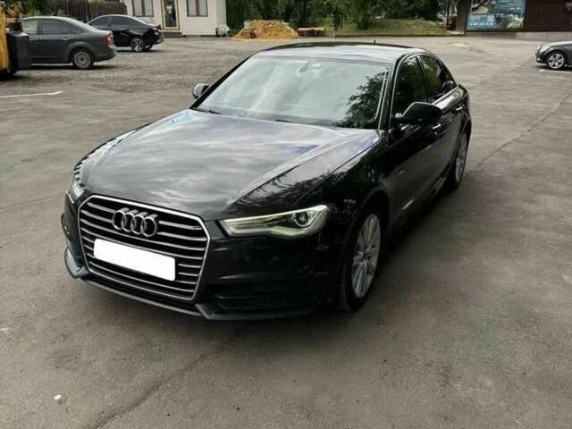 Чорний Ауді А6, об'ємом двигуна 2 л та пробігом 169 тис. км за 15700 $, фото 1 на Automoto.ua