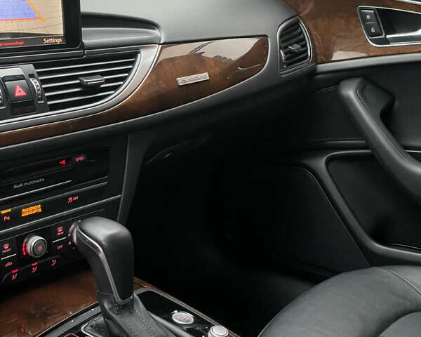 Черный Ауди А6, объемом двигателя 2 л и пробегом 193 тыс. км за 17850 $, фото 97 на Automoto.ua