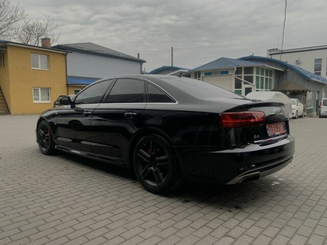 Черный Ауди А6, объемом двигателя 2 л и пробегом 165 тыс. км за 18800 $, фото 6 на Automoto.ua