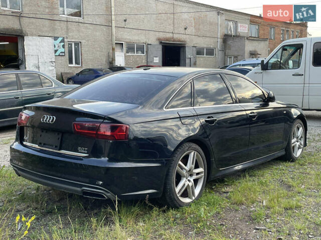 Черный Ауди А6, объемом двигателя 2 л и пробегом 218 тыс. км за 11800 $, фото 1 на Automoto.ua