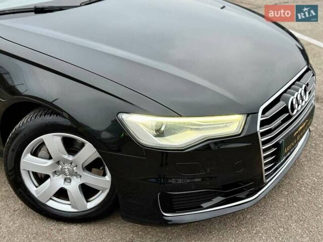 Чорний Ауді А6, об'ємом двигуна 1.98 л та пробігом 252 тис. км за 17200 $, фото 2 на Automoto.ua