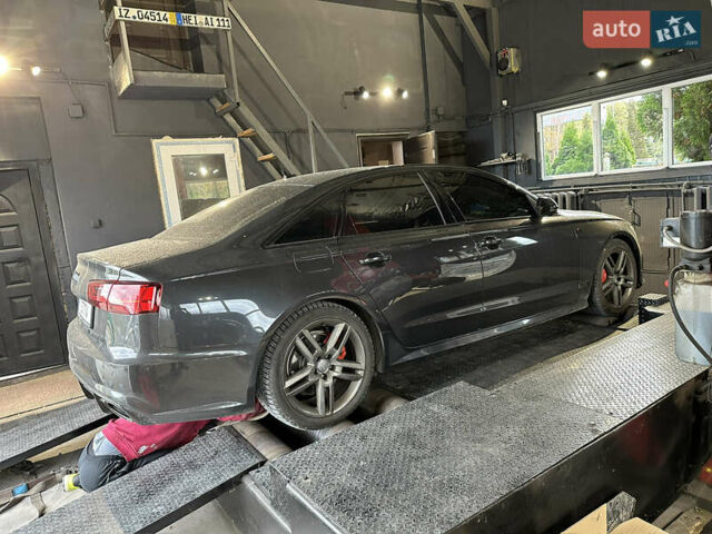 Черный Ауди А6, объемом двигателя 2 л и пробегом 225 тыс. км за 15000 $, фото 2 на Automoto.ua