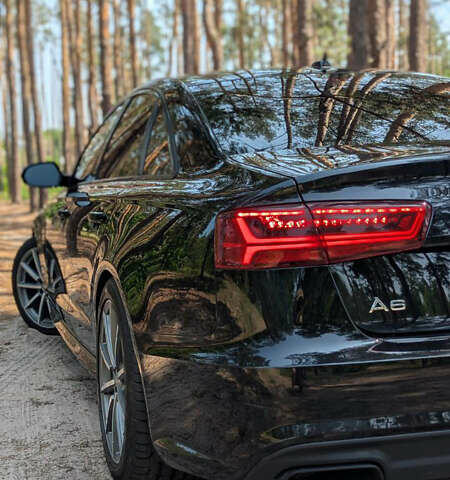 Черный Ауди А6, объемом двигателя 1.98 л и пробегом 142 тыс. км за 22500 $, фото 8 на Automoto.ua