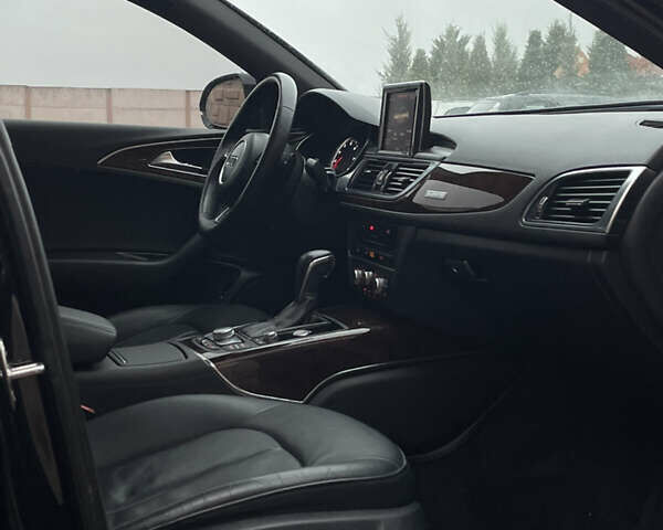 Черный Ауди А6, объемом двигателя 2 л и пробегом 193 тыс. км за 17850 $, фото 106 на Automoto.ua