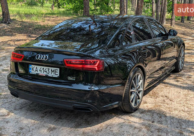 Черный Ауди А6, объемом двигателя 1.98 л и пробегом 142 тыс. км за 22500 $, фото 6 на Automoto.ua