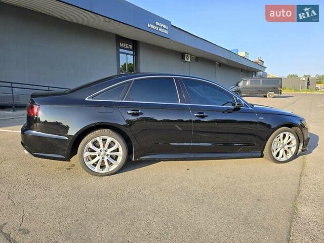 Черный Ауди А6, объемом двигателя 1.98 л и пробегом 100 тыс. км за 16450 $, фото 10 на Automoto.ua
