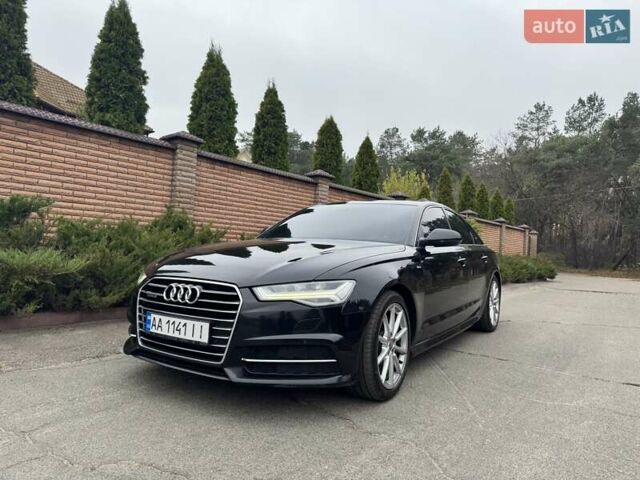 Черный Ауди А6, объемом двигателя 1.97 л и пробегом 184 тыс. км за 28500 $, фото 1 на Automoto.ua