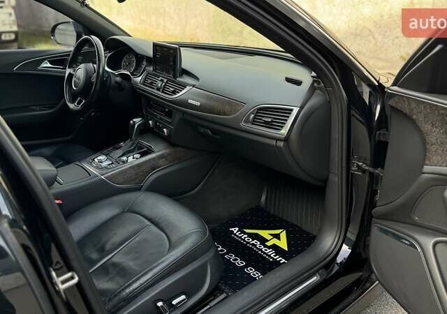 Черный Ауди А6, объемом двигателя 1.98 л и пробегом 104 тыс. км за 26000 $, фото 20 на Automoto.ua