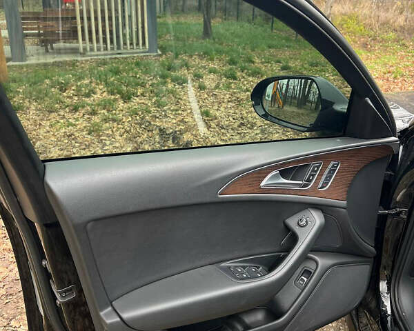 Черный Ауди А6, объемом двигателя 2 л и пробегом 124 тыс. км за 23500 $, фото 8 на Automoto.ua