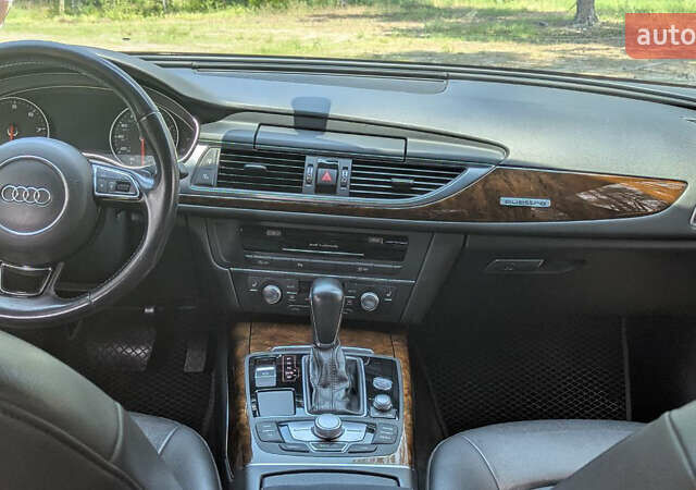 Черный Ауди А6, объемом двигателя 1.98 л и пробегом 142 тыс. км за 22500 $, фото 12 на Automoto.ua