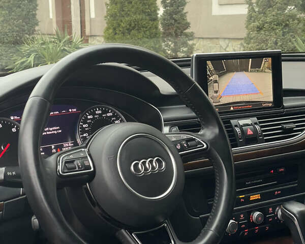 Черный Ауди А6, объемом двигателя 2 л и пробегом 193 тыс. км за 17850 $, фото 80 на Automoto.ua