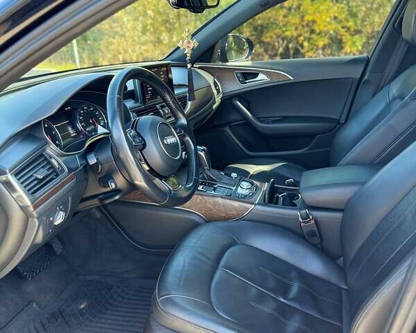 Черный Ауди А6, объемом двигателя 1.98 л и пробегом 206 тыс. км за 15500 $, фото 11 на Automoto.ua
