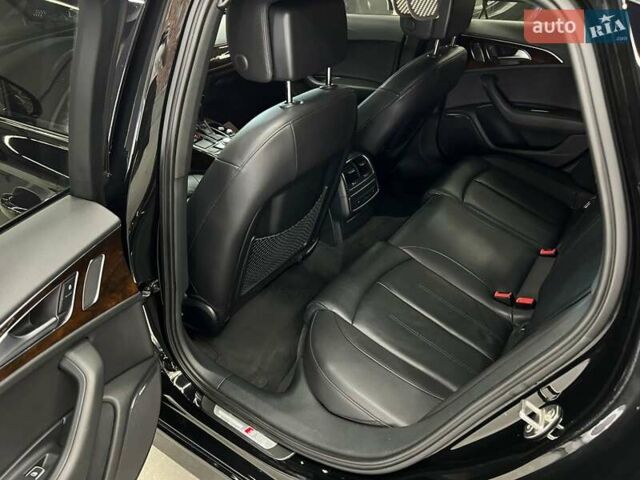 Черный Ауди А6, объемом двигателя 1.98 л и пробегом 148 тыс. км за 24000 $, фото 3 на Automoto.ua