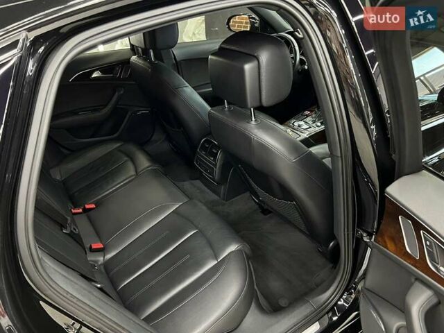 Черный Ауди А6, объемом двигателя 1.98 л и пробегом 148 тыс. км за 24000 $, фото 4 на Automoto.ua