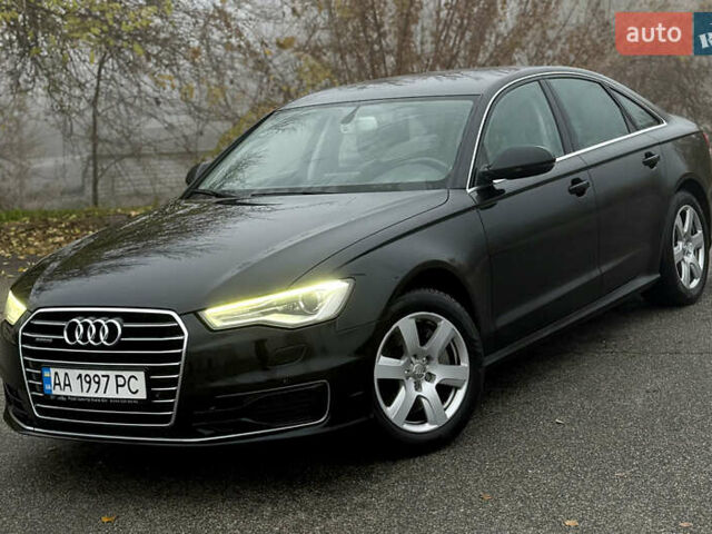 Черный Ауди А6, объемом двигателя 2 л и пробегом 250 тыс. км за 16000 $, фото 1 на Automoto.ua