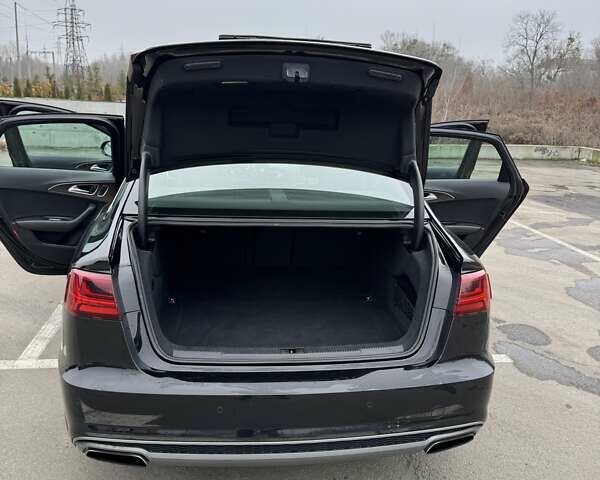 Черный Ауди А6, объемом двигателя 1.98 л и пробегом 179 тыс. км за 20500 $, фото 4 на Automoto.ua