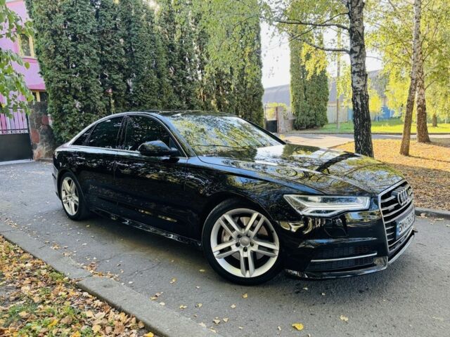 Черный Ауди А6, объемом двигателя 2 л и пробегом 68 тыс. км за 24500 $, фото 3 на Automoto.ua