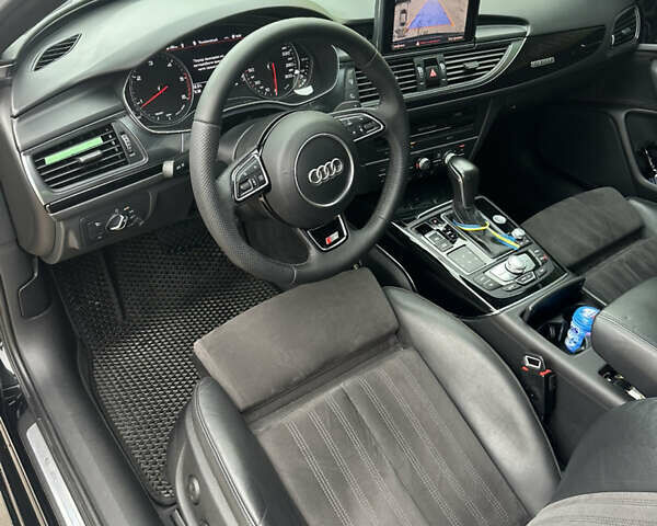 Чорний Ауді А6, об'ємом двигуна 1.97 л та пробігом 77 тис. км за 22500 $, фото 1 на Automoto.ua
