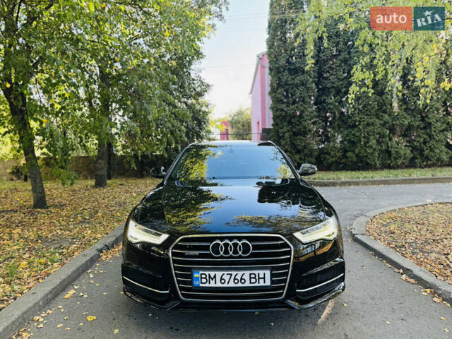 Черный Ауди А6, объемом двигателя 2 л и пробегом 68 тыс. км за 24500 $, фото 1 на Automoto.ua