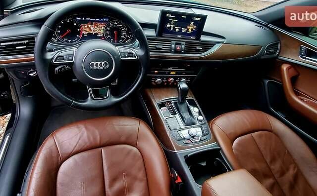 Черный Ауди А6, объемом двигателя 1.98 л и пробегом 119 тыс. км за 18900 $, фото 1 на Automoto.ua