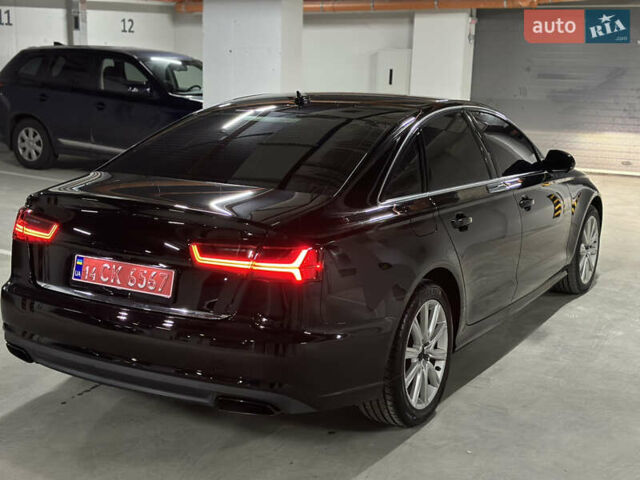 Чорний Ауді А6, об'ємом двигуна 2 л та пробігом 259 тис. км за 14300 $, фото 1 на Automoto.ua